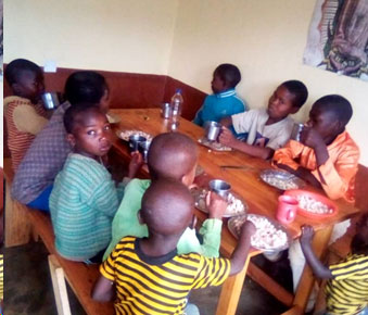 A group of kids posing for the camera.